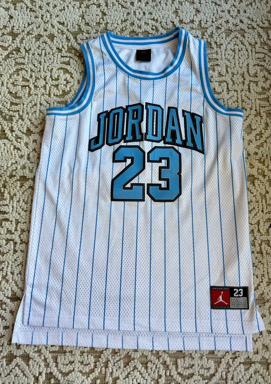 Youth Jordan Jersey Light Blue stripe Size Large